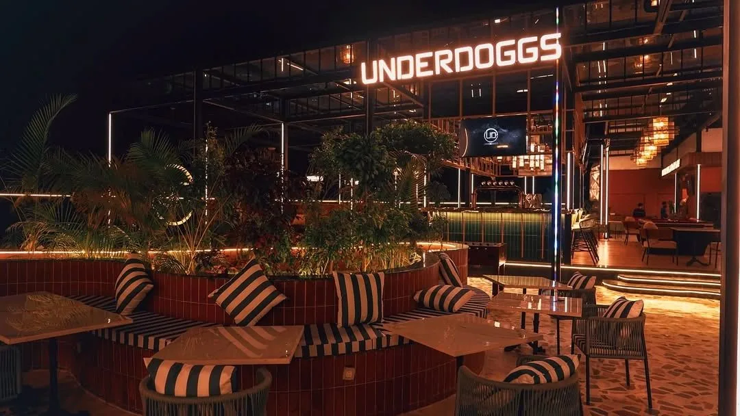 Outdoor seating at Underdoggs Dehradun at night
